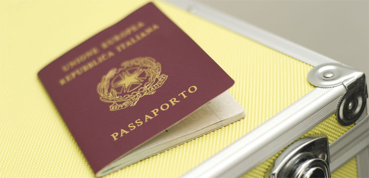 44249958 - passport and suitcase
