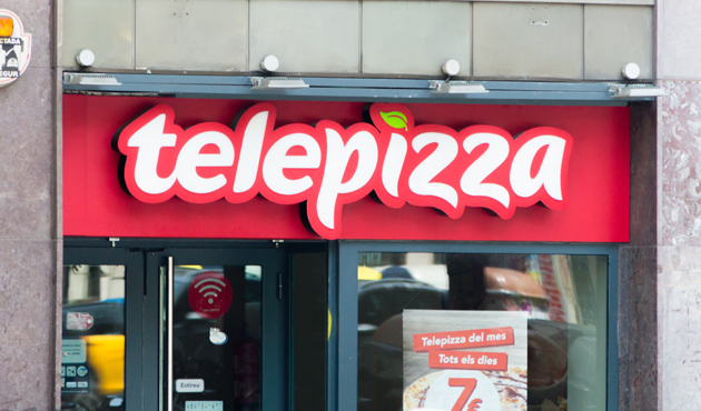 Barcelona, Spain - June 10, 2018: Telepizza logo and sign of piz